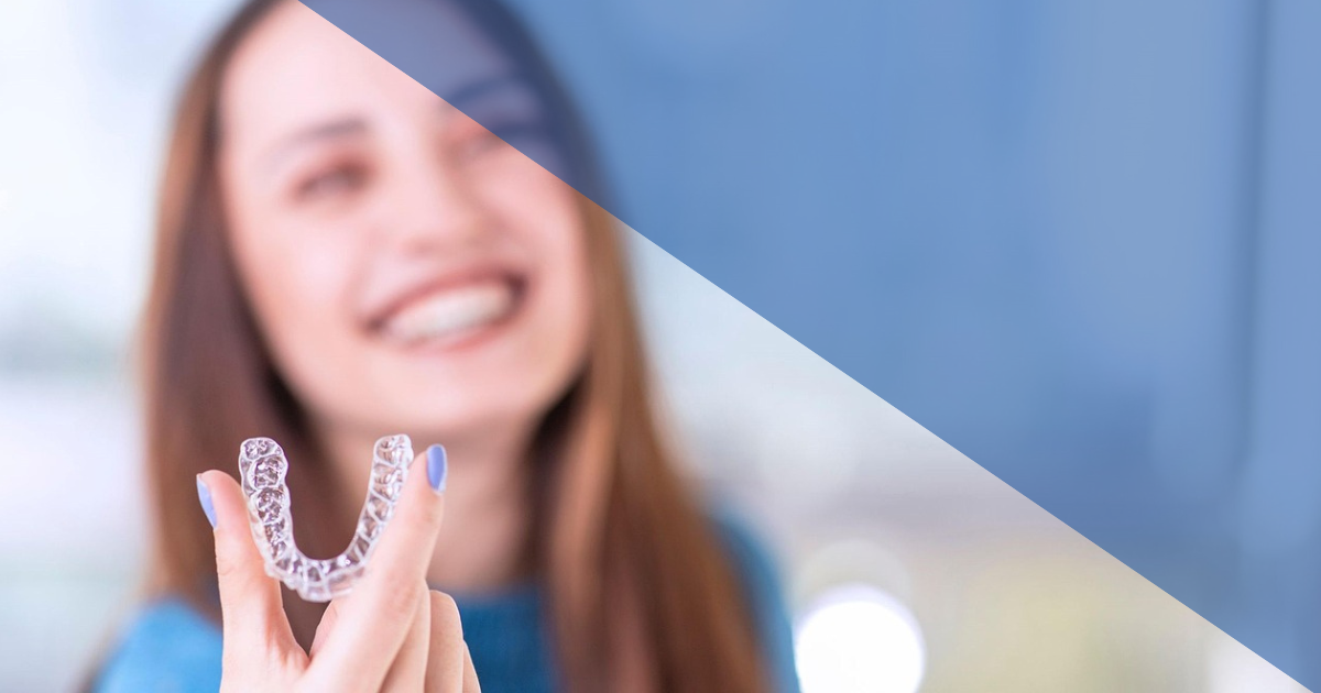 woman holding orthondotic care appliance clear aligner